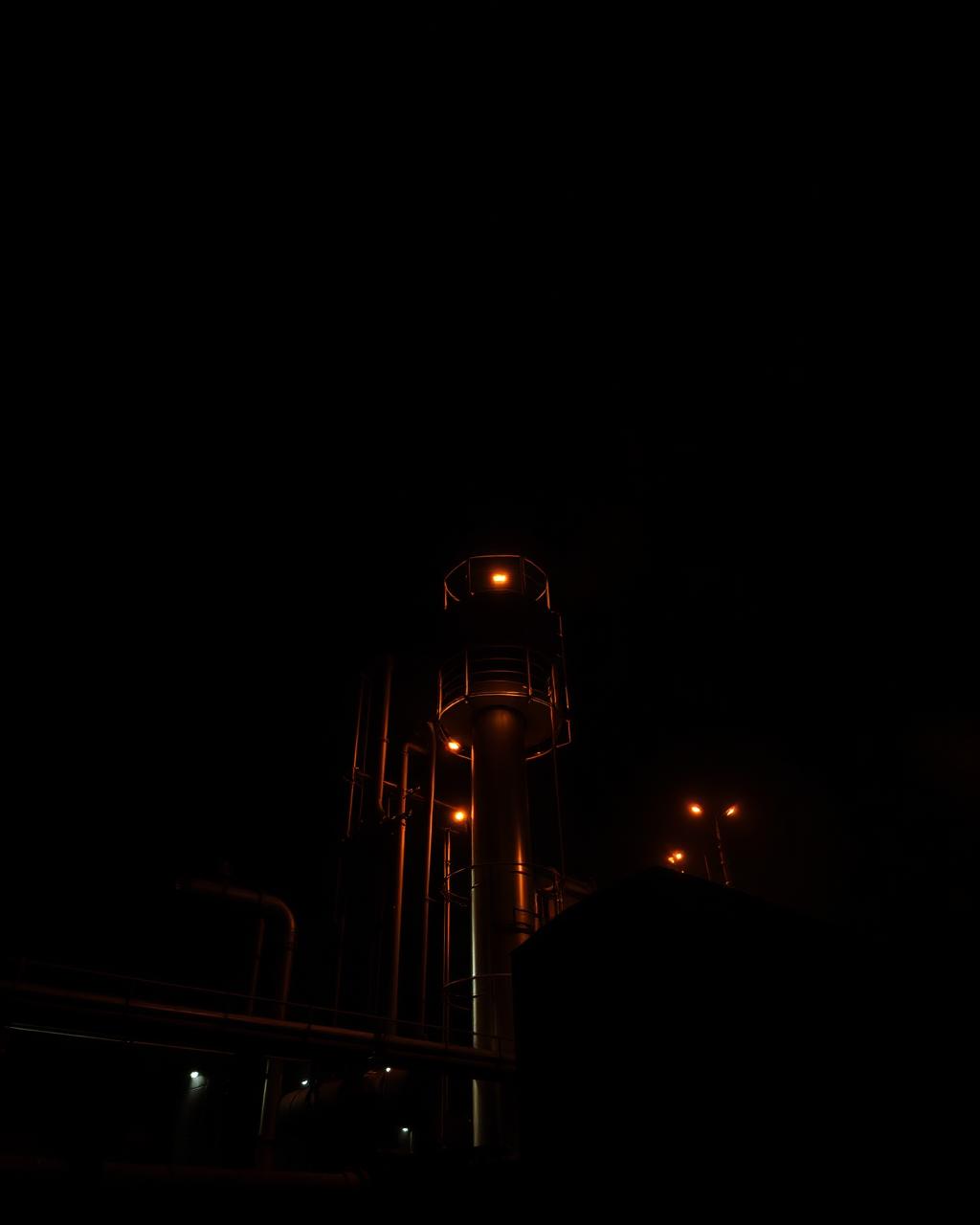 Industrial gas facility at night